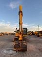 Front of used Excavator,Used Excavator,Side of used Komatsu Excavator,Back of used Excavator,Used Komatsu Excavator,Side of used Excavator under setting sun